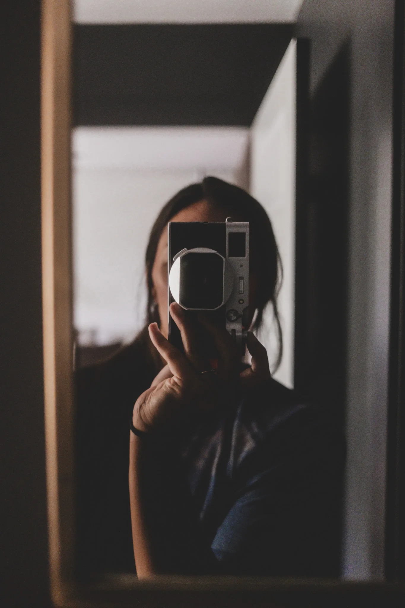 dana's mirror selfie with a fujifilm x100v