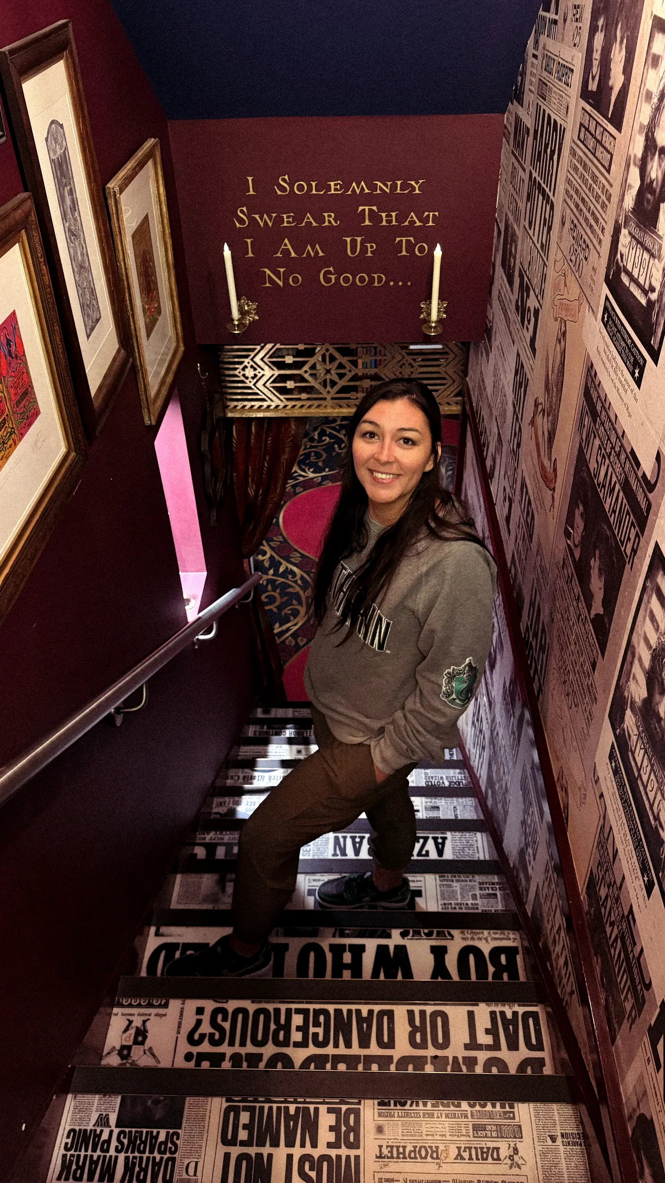 dana standing on the stairs inside House of MinaLima in london