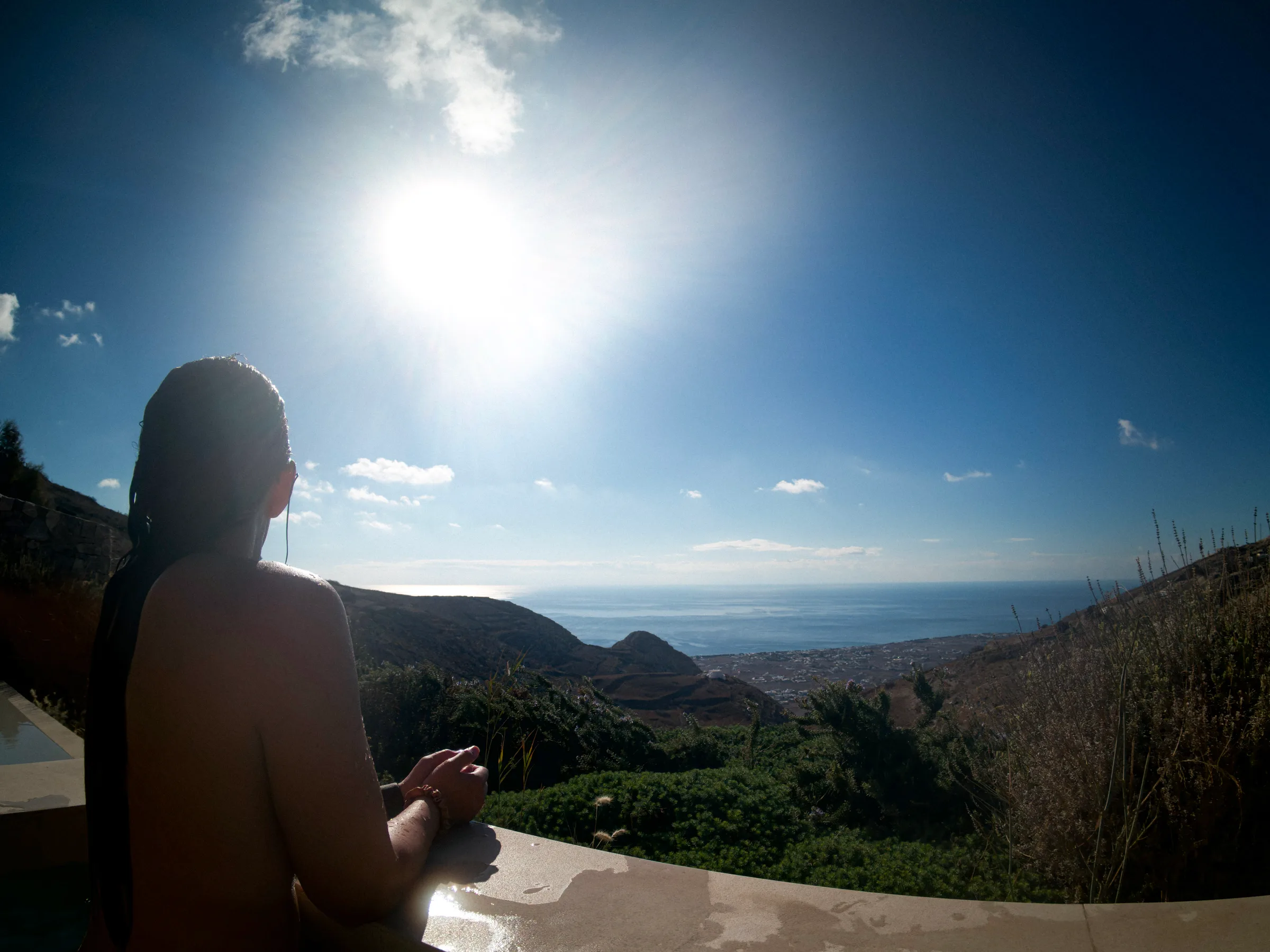 overlooking the southern aegean sea from the private pool at Santorini Sky resort